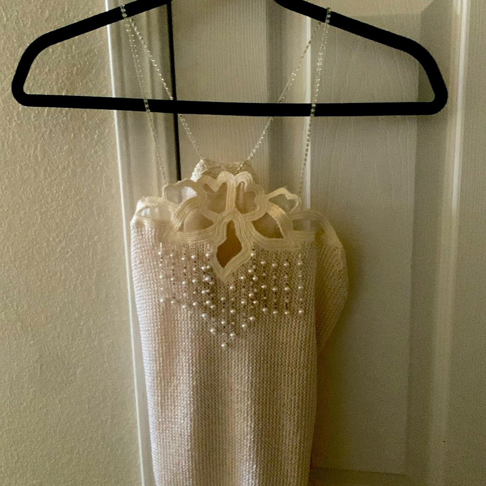 Sweater with rhinestone straps and beading hang down of see through appliqué